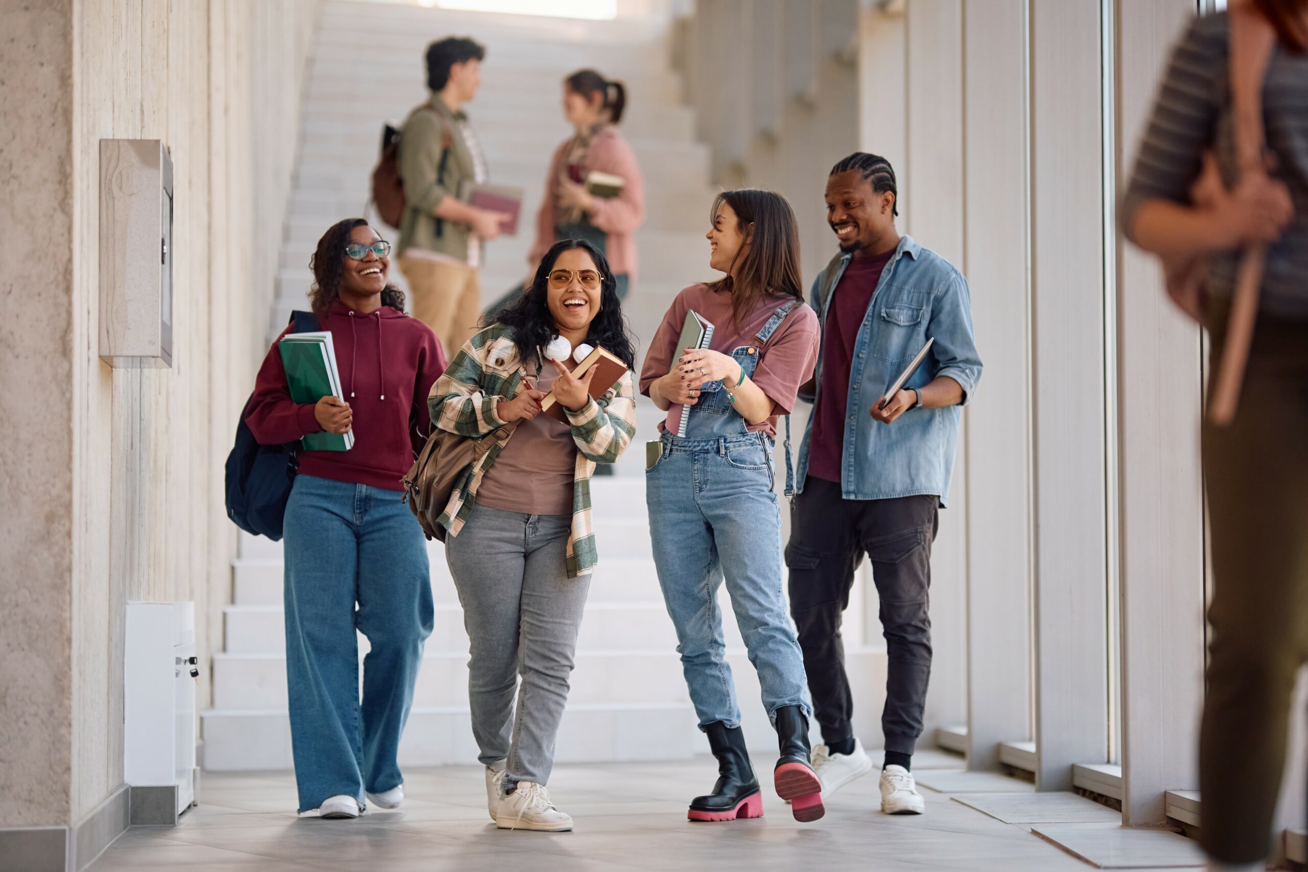 happy-university-friends-having-fun-after-a-lectur-2025-05-13-09-31-56-utc (1)